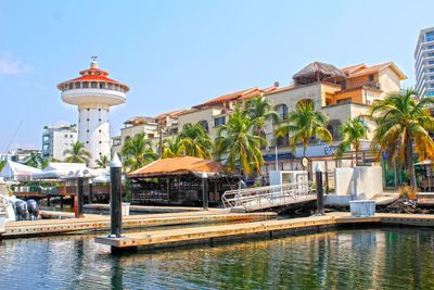 Buildings at waterfront in city