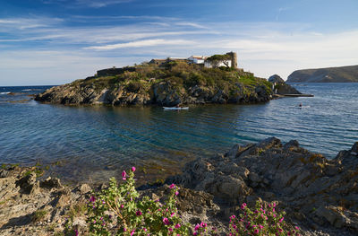 Scenic view of bay against sky