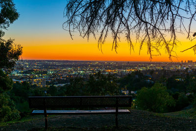 Scenic view of sunset over city