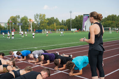 People exercising in park