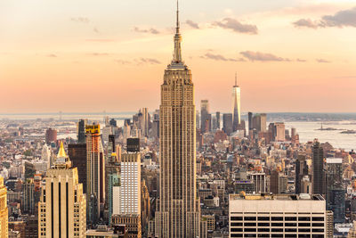 Cityscape against sky during sunset