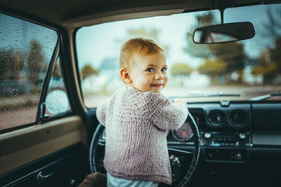 Woman sitting in car