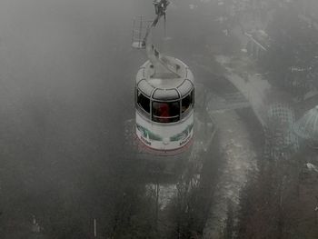 High angle view of nautical vessel in lake during winter