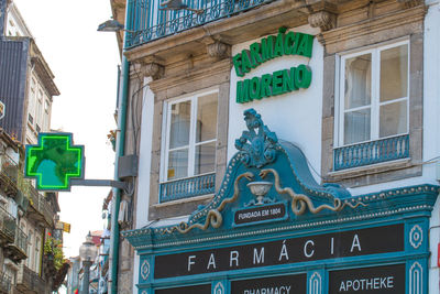 Low angle view of text on building