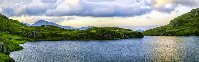 Sunrise on fagaras high mountain ridge. romanian mountain landscape with high peaks over 2200m