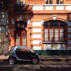 Cars parked in front of building