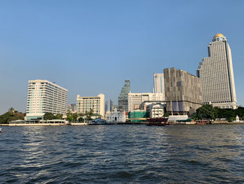 Buildings in city at waterfront