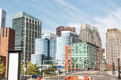 View of buildings in city against sky