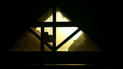 Close-up of clock on window