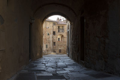 The way forward through an arched alley