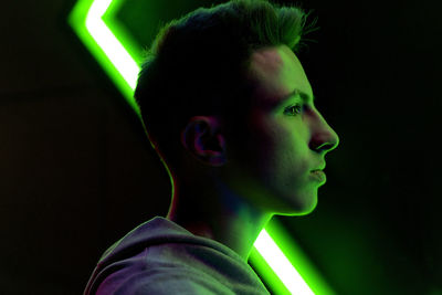Portrait of young man looking away