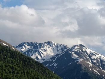 Scenic view of mountains against sky during winter