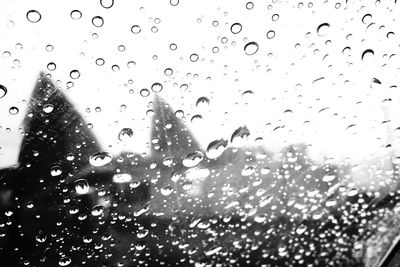 Close-up of water drops on glass