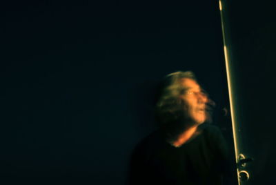 Full length of woman at night