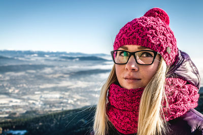 Close-up of woman against sky