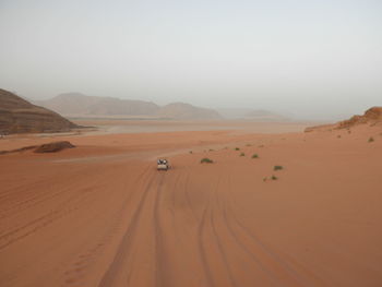 Scenic view of desert against sky