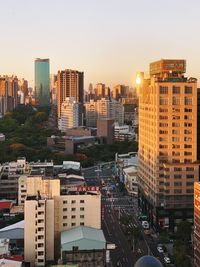 High angle view of buildings against sky during sunset