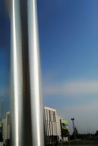 Low angle view of built structure against blue sky