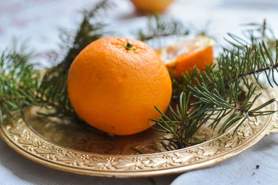 Close-up of orange fruit on table