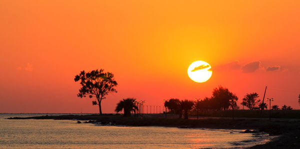 Scenic view of sea at sunset