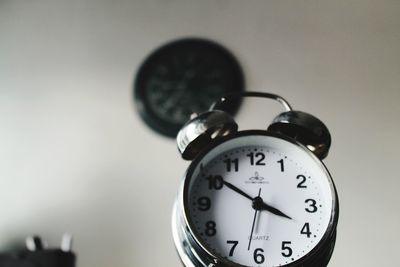 Close-up of clock on table