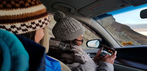 Women traveling in car