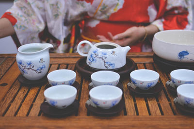 Close-up of tea cups on table