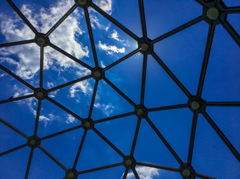 Low angle view of metallic structure against sky