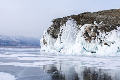 Scenic view of frozen sea against sky