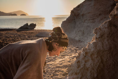 Side view of people on beach