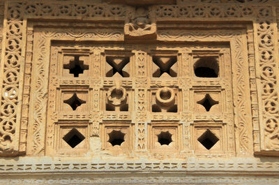 Low angle view of carving on building