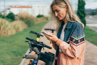 Young woman using mobile phone