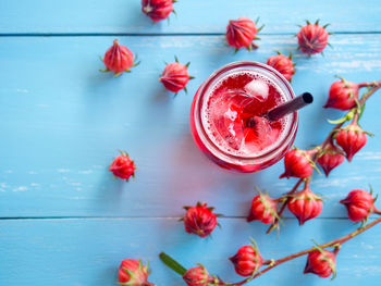 Directly above shot of fruits and drink on table