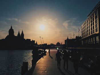 Silhouette of city at sunset