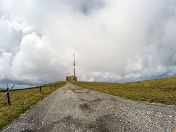 Road amidst landscape against sky