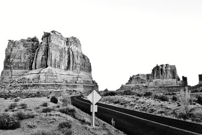 View of rocky mountain against clear sky