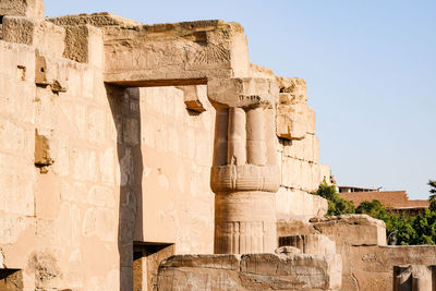 Stone pillar and wall in  egyptian temple.