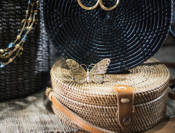 Close-up of wicker containers on table