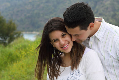 Portrait of smiling young couple