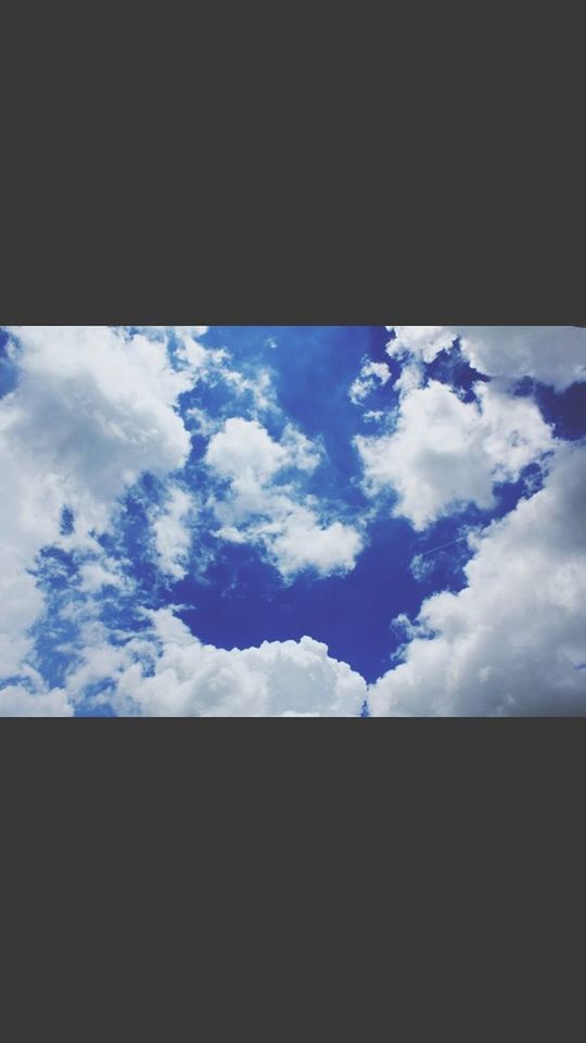 sky, cloud - sky, silhouette, cloud, tranquility, low angle view, scenics, beauty in nature, tranquil scene, cloudy, nature, transfer print, blue, copy space, dark, auto post production filter, no people, outdoors, day, idyllic