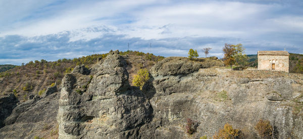 Panoramic view of cliff against sky