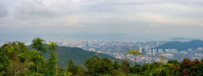 Panoramic view of cityscape against sky