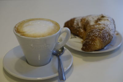 Close-up of coffee served on table