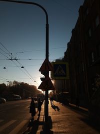 People walking on street in city