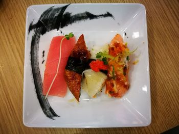 High angle view of salad in plate on table