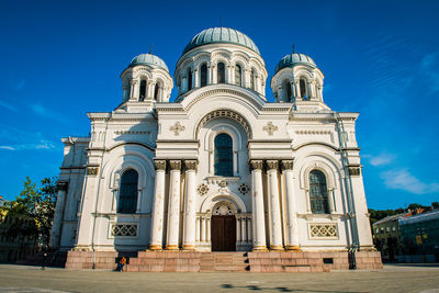 Low angle view of building against blue sky