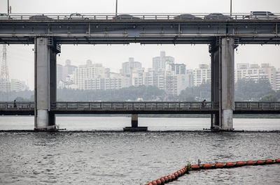 Bridge over river in city