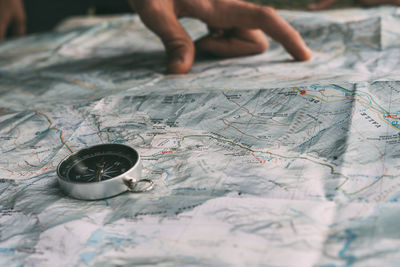 Planning the route on a map and a compass