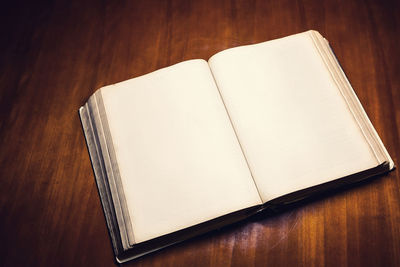 High angle view of open book on table