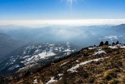 View of the snow-capped alps from cima marana near recoaro vicenza italy